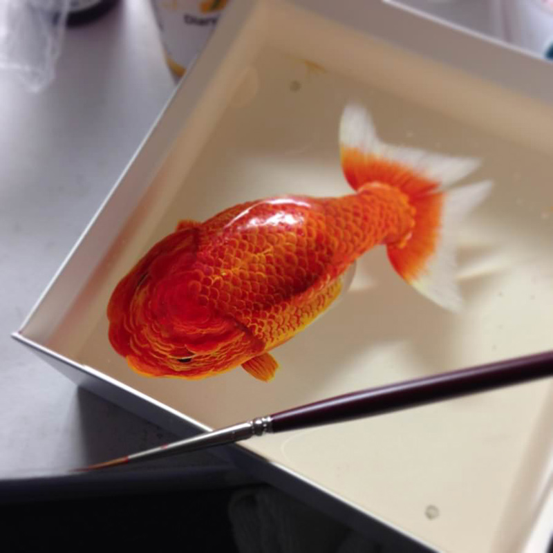 peinture et sculpture réaliste de poisson